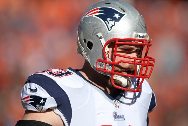 January 19, 2014; Denver, CO, USA; New England Patriots offensive lineman Dan Connolly (63) against the Denver Broncos in the 2013 AFC Championship football game at Sports Authority Field at Mile High. Mandatory Credit: Mark J. Rebilas-USA TODAY Sports