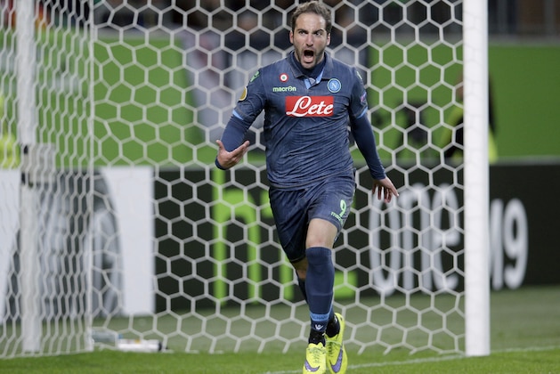 Napoli's Gonzalo Higuain celebrates after his side's first goal during the Europa League first leg quarterfinal soccer match between VfL Wolfsburg and SSC Napoli in Wolfsburg, Germany, Thursday, April 16, 2015. (AP Photo/Michael Sohn)