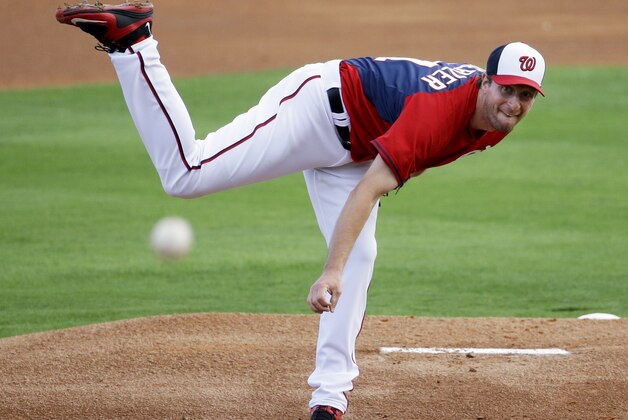 Washington Nationals starting pitcher Max Scherzer throws in the first inning of an exhibition spring training baseball game against the New York Mets, Thursday, March 5, 2015, in Viera, Fla. (AP Photo/David Goldman)