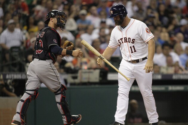 Houston Astros' Evan Gattis reacts after striking out during the sixth inning of a baseball game against the Cleveland Indians, Wednesday, April 8, 2015, in Houston. (AP Photo/Patric Schneider)