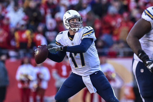 San Diego Chargers quarterback Philip Rivers (17) looks to throw against the Kansas City Chiefs during the second half of their NFL football game in Kansas City, Mo., Sunday, Dec. 28, 2014. (AP Photo/Reed Hoffmann)