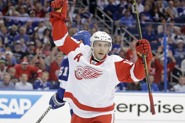Detroit Red Wings center Pavel Datsyuk (13), of Russia, celebrates his goal against the Tampa Bay Lightning during the first period of Game 1 of an NHL Eastern Conference playoff hockey series Thursday, April 16, 2015, in Tampa, Fla. (AP Photo/Chris O'Meara)