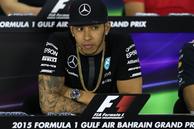 Mercedes driver Lewis Hamilton of Britain listens to question during a news conference ahead the Bahrain Formula One Grand Prix at the Formula One Bahrain International Circuit in Sakhir, Bahrain, Thursday, April 16, 2015. The Bahrain Formula One Grand Prix will take place here on Sunday. (AP Photo/Hassan Ammar)