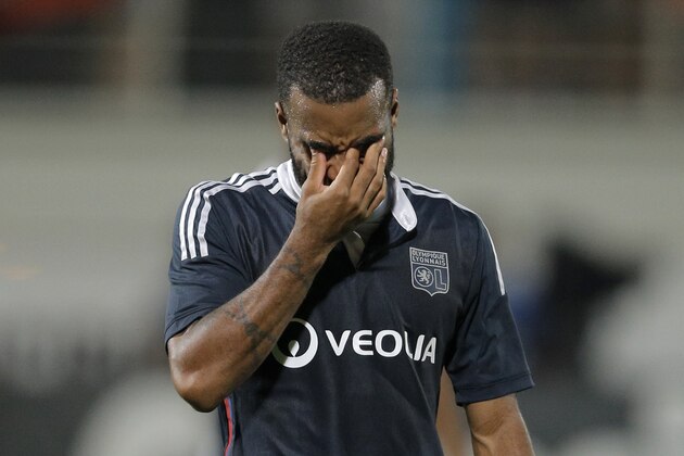 Olympique Lyon's Alexandre Lacazette leaves the pitch after the second leg of a UEFA Europa League playoff soccer match against Astra Giurgiu, in Giurgiu, Romania, Thursday, Aug. 28, 2014. (AP Photo/Vadim Ghirda)