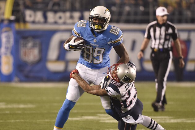 San Diego Chargers tight end Ladarius Green runs upfield as Patrick Chung defends during the first half in an NFL football game Sunday, Dec. 7, 2014, in San Diego. (AP Photo/Denis Poroy)