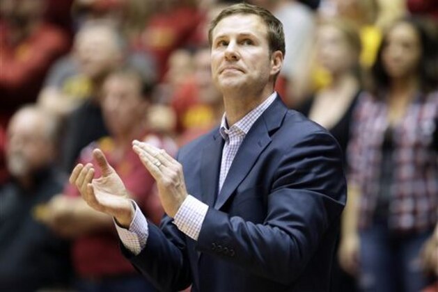 FILE - In this March 2, 2015, file photo, Iowa State head coach Fred Hoiberg checks the scoreboard during the second half of an NCAA college basketball game against Oklahoma in Ames, Iowa. Hoiberg is scheduled to have open heart surgery next week to replace his aortic valve. The school said Hoiberg, who retired from the NBA following the 2004-05 season because of heart issues, will have the procedure next Friday, April 17, 2015, at the Mayo Clinic in Rochester, Minnesota. (AP Photo/Charlie Neibergall, File)