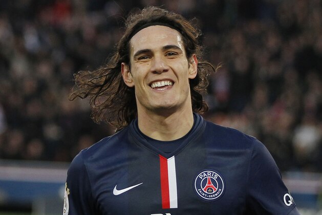PSG's Uruguayan Edinson Cavani, as he missed a kick during a League One soccer match Paris Saint Germain against Lens at Parc des Prince stadium in Paris, France, Saturday, March 7, 2015. (AP Photo/Michel Euler)