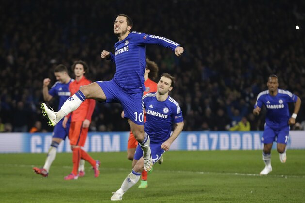 Chelsea's Eden Hazard celebrates after scoring his side's second goal during the Champions League round of 16 second leg soccer match between Chelsea and Paris Saint Germain at Stamford Bridge stadium in London, Wednesday, March 11, 2015. (AP Photo/Matt Dunham)