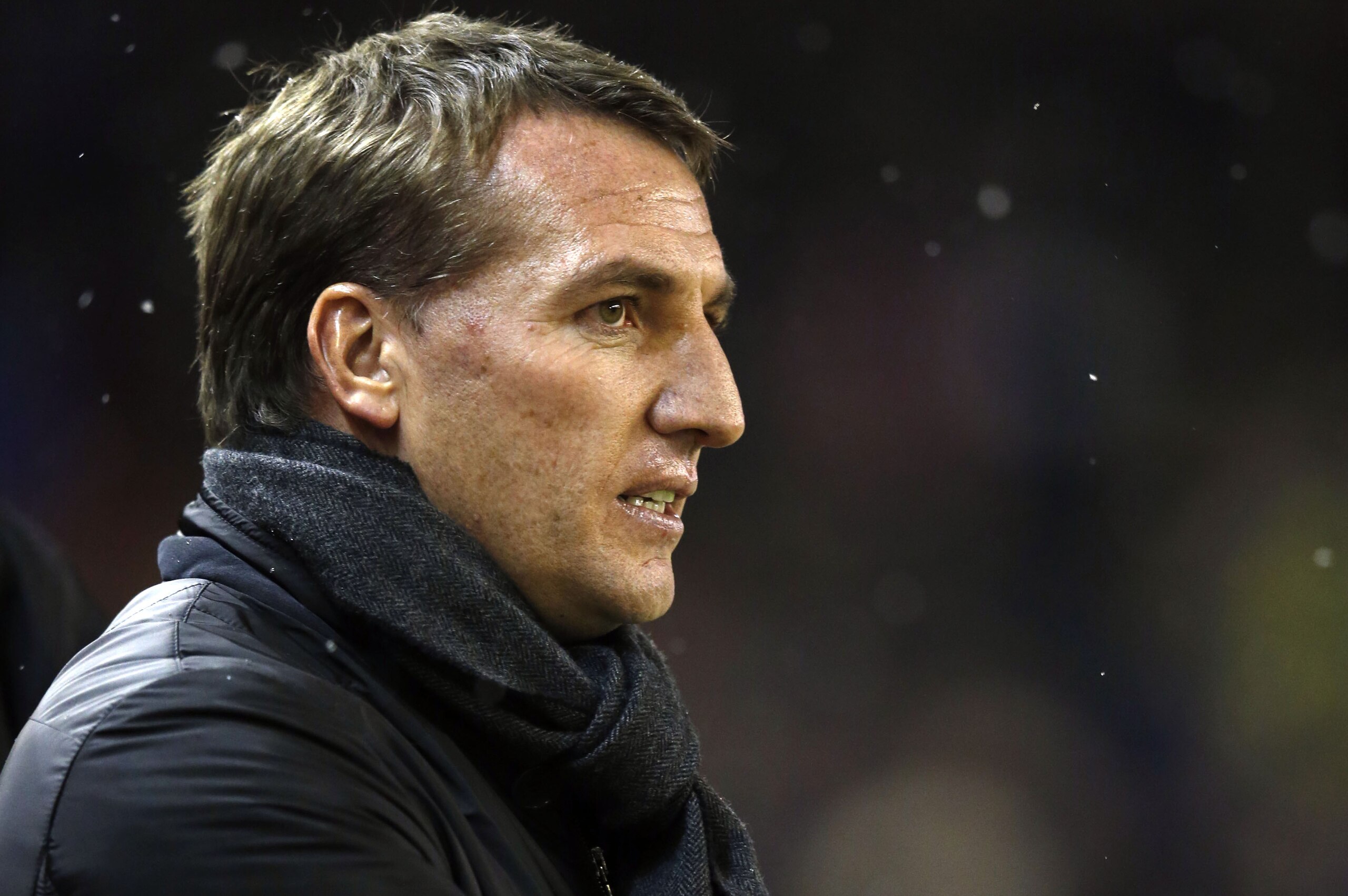 Liverpool's head coach Brendan Rodgers takes to the touchline before the English League Cup semi-final first leg soccer match between Liverpool and Chelsea at Anfield Stadium, Liverpool, England, Tuesday Jan. 20, 2015. (AP Photo/Jon Super)