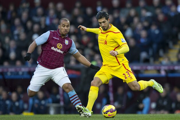 Liverpool's Emre Can, right, clears the ball away from Aston Villa's Gabriel Agbonlahor during the English Premier League soccer match between Aston Villa and Liverpool at Villa Park Stadium, Birmingham, England, Saturday Jan. 17, 2015. (AP Photo/Jon Super)