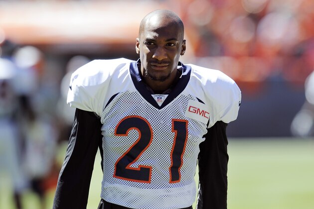 Denver Broncos cornerback Aqib Talib warms up at NFL training camp at Sports Authority Field at Mile High on Saturday, Aug. 2, 2014, in Denver. (AP Photo/Chris Schneider)