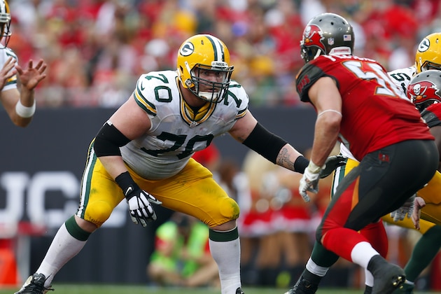 Green Bay Packers guard T.J. Lang (70) sets to block against the Tampa Bay Buccaneers during an NFL football game Sunday, Dec. 21, 2014, in Tampa, Fla. The Packers won 20-3. (Jeff Haynes/AP Images for Panini)