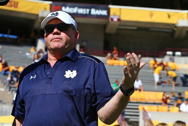 Nov 8, 2014; Tempe, AZ, USA; Notre Dame Fighting Irish head coach Brian Kelly reacts against the Arizona State Sun Devils at Sun Devil Stadium. Arizona State defeated Notre Dame 55-31. Mandatory Credit: Mark J. Rebilas-USA TODAY Sports