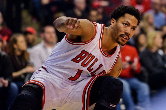 Chicago Bulls guard Derrick Rose (1)  against the Philadelphia 76ers during the first half of an NBA basketball game Saturday, April 11, 2015, in Chicago. (AP Photo/Matt Marton)