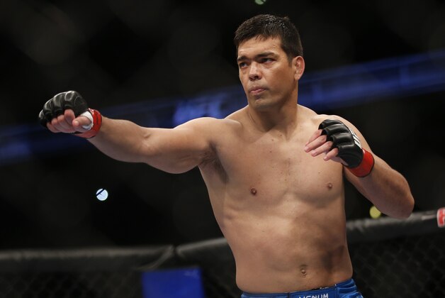 Lyoto Machida Dan Henderson during their UFC 157 light heavyweight mixed martial arts match in Anaheim, Calif., Saturday, Feb. 23, 2013. Machida won by split decision after the third round. (AP Photo/Jae C. Hong)