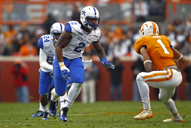 Kentucky defensive end Alvin Dupree (2) battles with Tennessee running back Jalen Hurd (1) during an NCAA college football game Saturday, Nov. 15, 2014 in Knoxville, Tenn. (AP Photo/Wade Payne)