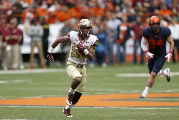 Florida State wide receiver Rashad Greene (80) in action against Syracuse during the first half of an NCAA college football game on Saturday, Oct. 11, 2014, in Syracuse, N.Y. (AP Photo/Mike Groll)
