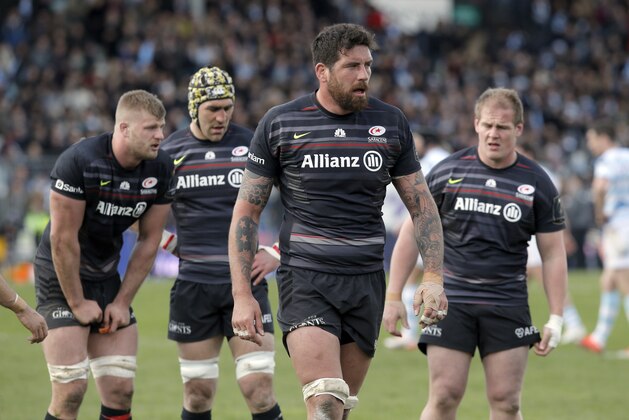 Saracens' Jim Hamilton, second right, and teammates pause during their European Champions Cup quarterfinal Racing Metro against Saracens at Yves Du Manoir Stadium in Colombes, north of Paris, France, Sunday, April 5, 2015. (AP Photo/Francois Mori)
