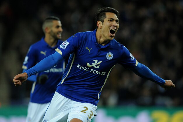 Leicester's Leonardo Ulloa celebrates after scoring against Liverpool during the English Premier League soccer match between Leicester City and Liverpool at King Power Stadium, in Leicester, England, Tuesday, Dec. 2, 2014.  (AP Photo/Rui Vieira)