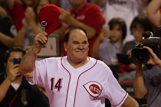 Sep 6, 2013; Cincinnati, OH, USA; Pete Rose of the Big Red Machine takes the field after the Reds 3-2 win over the Los Angeles Dodgers  at Great American Ball Park. Mandatory Credit: Rob Leifheit-USA TODAY Sports