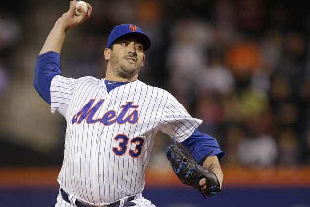 New York Mets starting pitcher Matt Harvey (33) delivers during the first inning of a baseball game against the Philadelphia Phillies in New York, Tuesday, April 14, 2015. (AP Photo/Kathy Willens)