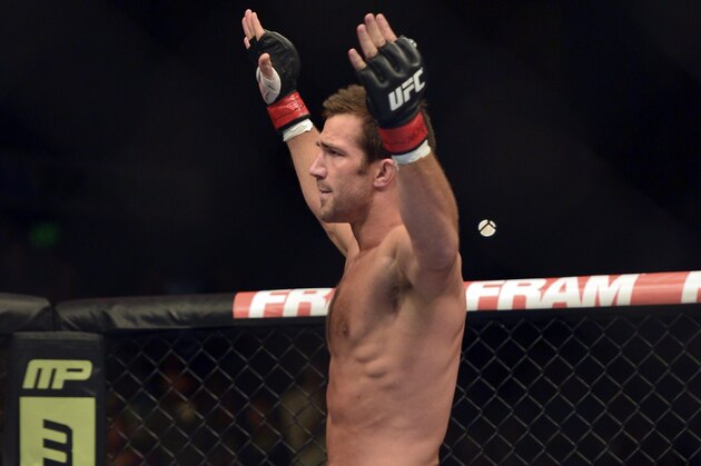 Apr 26, 2014; Baltimore, MD, USA; Luke Rockhold celebrates after his first round submission in UFC 172  at  Baltimore Arena.  Mandatory Credit: Tommy Gilligan-USA TODAY Sports