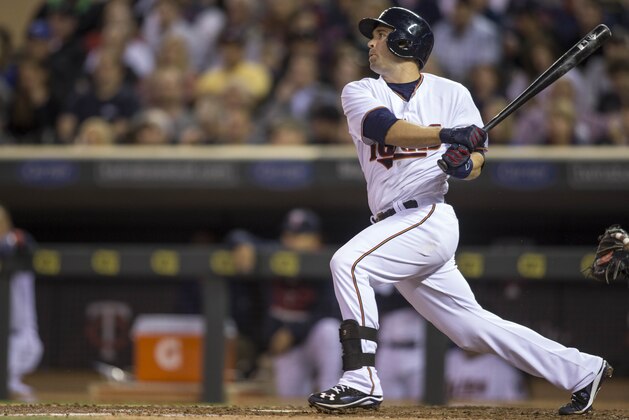 Brian Dozier of the Minnesota Twins bats against the Kansas City Royals Wednesday, April 15, 2015, in Minneapolis. The Twins win 3-1. (AP Photo/Bruce Kluckhohn)
