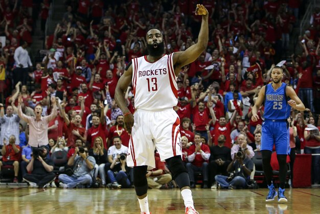 Apr 18, 2015; Houston, TX, USA; Houston Rockets guard James Harden (13) reacts after making a three point basket during the first quarter against the Dallas Mavericks in game one of the first round of the NBA Playoffs at Toyota Center. Mandatory Credit: Troy Taormina-USA TODAY Sports