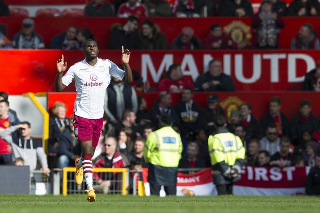 Aston Villa's Christian Benteke celebrates after scoring during the English Premier League soccer match between Manchester United and Aston Villa at Old Trafford Stadium, Manchester, England, Saturday, April 4, 2015. (AP Photo/Jon Super)