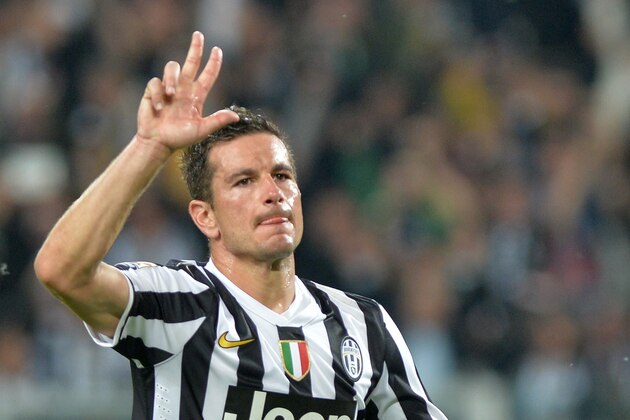 Juventus Simone Padoin celebrates after scoring during a Serie A soccer match between Juventus and Atalanta at the Juventus stadium, in Turin, Italy, Monday, May 6, 2014. (AP Photo/Massimo Pinca)