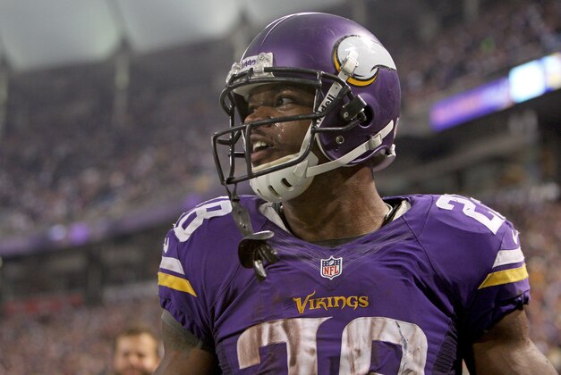 Dec 1, 2013; Minneapolis, MN, USA; Minnesota Vikings running back Adrian Peterson (28) looks on during overtime against the Chicago Bears at Mall of America Field at H.H.H. Metrodome. The Vikings defeated the Bears 23-20 in overtime. Mandatory Credit: Brace Hemmelgarn-USA TODAY Sports
