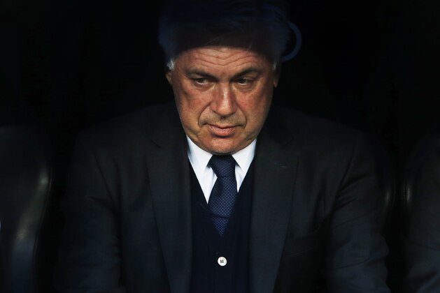 Real Madrid's coach Carlo Ancelotti attends a Spanish La Liga soccer match between Real Madrid and Malaga at the Santiago Bernabeu stadium in Madrid, Spain, Saturday, April 18, 2015. (AP Photo/Andres Kudacki)