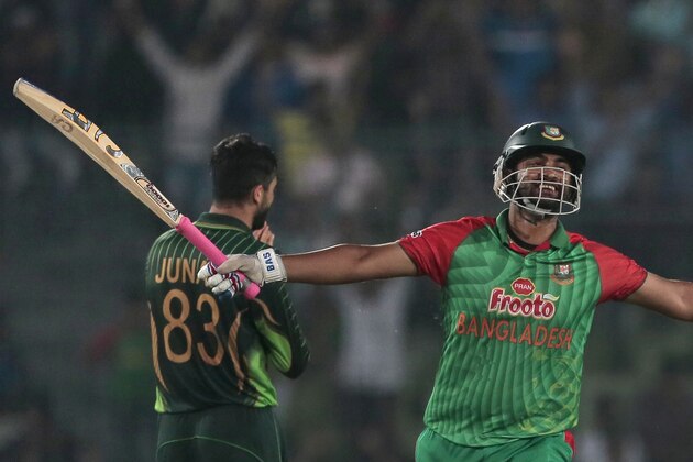 Bangladesh’s Tamim Iqbal celebrates after scoring hundred runs during the second one-day international cricket match against Pakistan in Dhaka, Bangladesh, Sunday, April 19, 2015. (AP Photo/ A.M. Ahad)