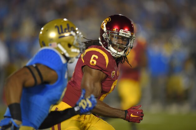 Southern California cornerback Josh Shaw, right, guards UCLA wide receiver Jordan Payton during the first half of an NCAA college football game, Saturday, Nov. 22, 2014, in Pasadena, Calif. (AP Photo/Mark J. Terrill)