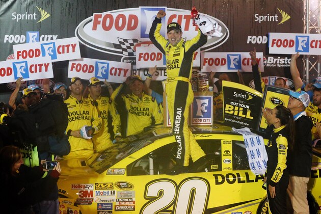 Apr 19, 2015; Bristol, TN, USA; NASCAR Sprint Cup Series driver Matt Kenseth (20) celebrates after winning  the Food City 500 at Bristol Motor Speedway. Mandatory Credit: Randy Sartin-USA TODAY Sports
