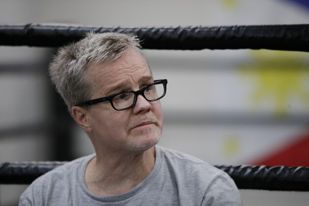 Boxer Manny Pacquiao's trainer Freddie Roach sits at the ringside during a workout with Pacquiao, Monday, April 13, 2015, in Los Angeles. Pacquiao will face Floyd Mayweather Jr. in a welterweight boxing match in Las Vegas on May 2. (AP Photo/Jae C. Hong)