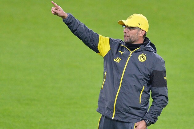 Borussia Dortmund coach Jurgen Klopp gestures during a training session at the Juventus Stadium in Turin, Italy, Monday, Feb. 23, 2015. Juventus will play Borussia Dortmund Tuesday in a Champions League round of 16 soccer match. (AP Photo/Alessandro Di Marco, Ansa) ITALY OUT