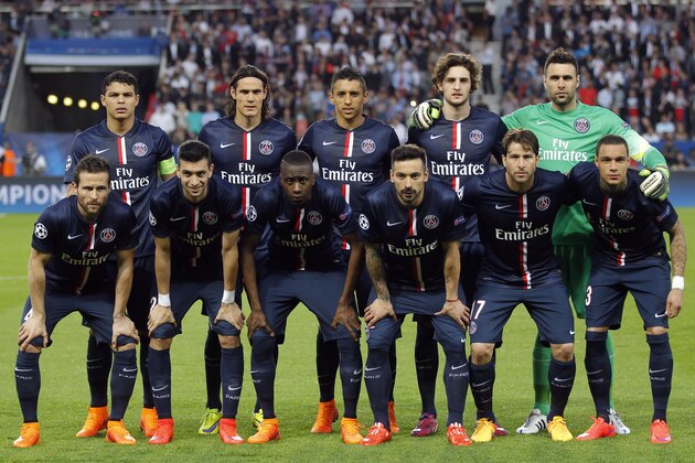 PSG's players pose for a group photo before the quarterfinal first leg Champions League soccer match against Barcelona at the Parc des Princes stadium in Paris, France, Wednesday, April 15, 2015. (AP Photo/Michel Euler)
