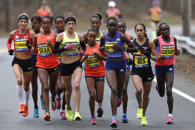 Apr 20, 2015; Boston, MA, USA; Amy Cragg (USA) runs with the pack during the 2015 Boston Marathon. Mandatory Credit: Greg M. Cooper-USA TODAY Sports