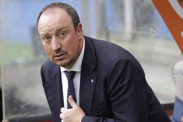 Napoli’s coach Rafael Benitez arrives for a Serie A soccer match between Roma and Napoli at Rome's Olympic stadium, Saturday, April 4, 2015. (AP Photo/Alessandra Tarantino)
