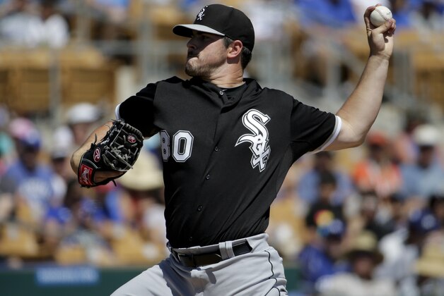Chicago White Sox starting pitcher Carlos Rodon throws against the Los Angeles Dodgers during the first inning of a spring training baseball exhibition game in Glendale, Ariz., on Tuesday, March 31, 2015. (AP Photo/Chris Carlson)