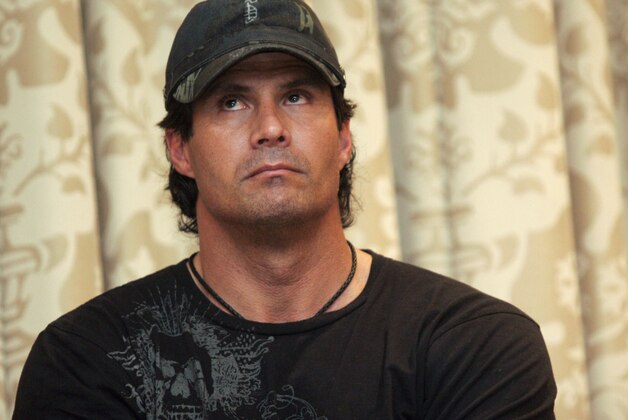 Former baseball player Jose Canseco pauses during a news conference in Beverly Hills, Calif., on Thursday, May 7, 2009. Canseco said baseball players have endured enough embarrassment over the steroid scandal and now it's time to investigate what role Major League Baseball and the players' association played in it. (AP Photo/Branimir Kvartuc)