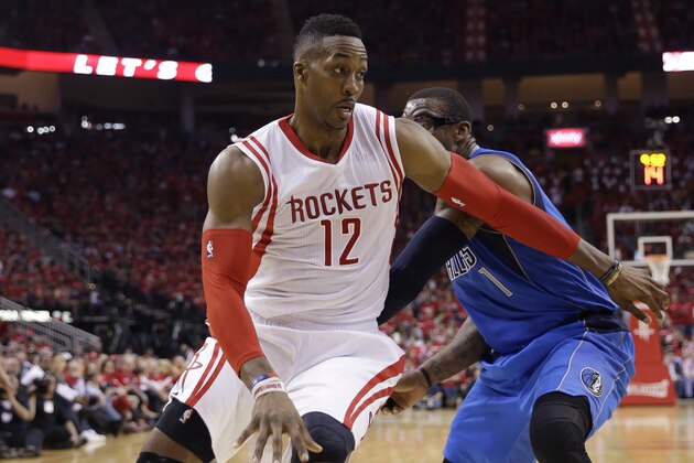 Houston Rockets' Dwight Howard (12) drives around Dallas Mavericks' Amar'e Stoudemire (1) during the second half of game 1 in the first round of the NBA basketball playoffs Saturday, April 18, 2015, in Houston. (AP Photo/David J. Phillip) Houston Rockets' Dwight Howard (12) drives around Dallas Mavericks' Amar'e Stoudemire (1) during the second half of game 1 in the first round of the NBA basketball playoffs Saturday, April 18, 2015, in Houston. (AP Photo/David J. Phillip)