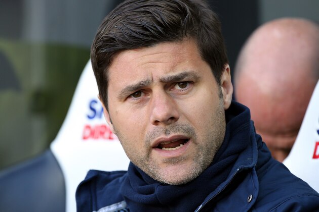 Tottenham Hotspur's manager Mauricio Pochettino awaits the start of their English Premier League soccer match between Newcastle United and Tottenham Hotspur at St James' Park, Newcastle, England, Sunday, April, 19, 2015. (AP Photo/Scott Heppell)