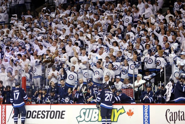 Apr 20, 2015; Winnipeg, Manitoba, CAN; Winnipeg Jets bench during first period with the sea of white behind them against the Anaheim Ducks in game three of the first round of the 2015 Stanley Cup Playoffs at MTS Centre. Mandatory Credit: Bruce Fedyck-USA TODAY Sports