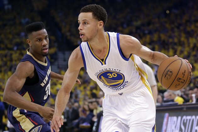 Golden State Warriors' Stephen Curry (30) dribbles past New Orleans Pelicans' Norris Cole during the first half in Game 2 of a first-round NBA basketball playoff series Monday, April 20, 2015, in Oakland, Calif. (AP Photo/Marcio Jose Sanchez)