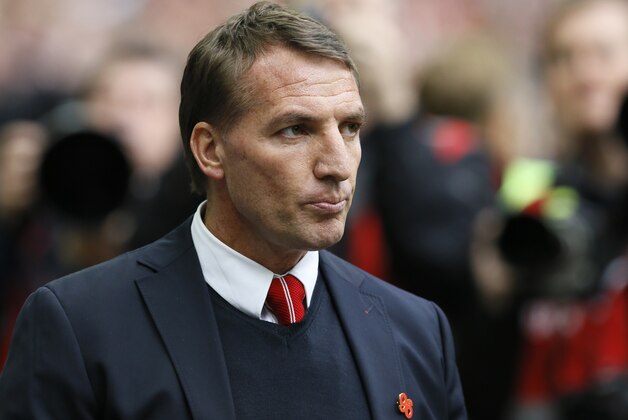 Liverpool's head coach Brendan Rodgers waits for the start of the English FA Cup semifinal soccer match between Liverpool and  Aston Villa at Wembley Stadium in London, Sunday, April 19, 2015. (AP Photo/Kirsty Wigglesworth)