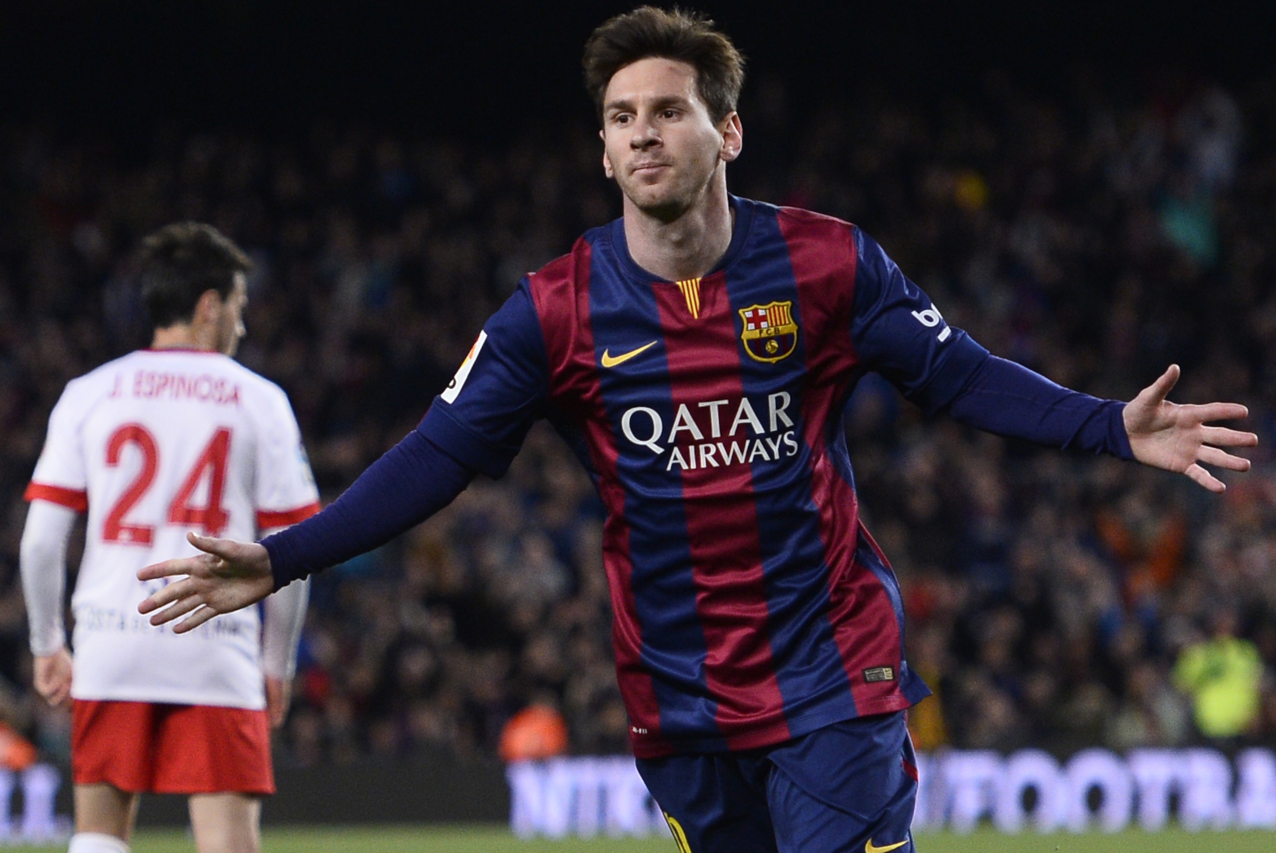 FC Barcelona's Lionel Messi, from Argentina, right, celebrates after scoring against Almeria during a Spanish La Liga soccer match at the Camp Nou stadium in Barcelona, Spain, Wednesday, April 8, 2015. (AP Photo/Manu Fernandez) FC Barcelona's Lionel Messi, from Argentina, right, celebrates after scoring against Almeria during a Spanish La Liga soccer match at the Camp Nou stadium in Barcelona, Spain, Wednesday, April 8, 2015. (AP Photo/Manu Fernandez)