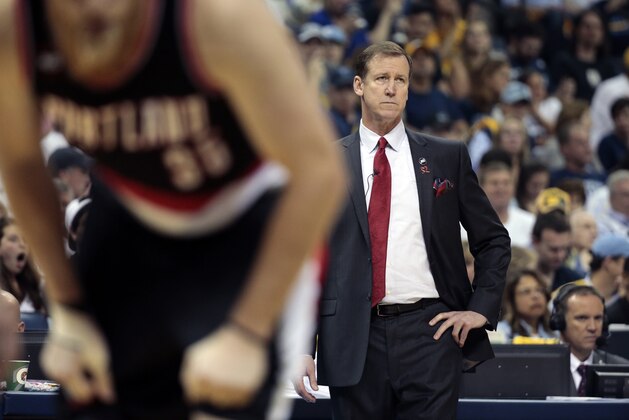 Portland Trail Blazers head coach Terry Stotts watches from the sideline in the first half of Game 1 of an NBA basketball Western Conference playoff series against the Memphis Grizzlies Sunday, April 19, 2015, in Memphis, Tenn. (AP Photo/Mark Humphrey)