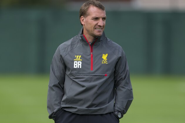 Liverpool's manager Brendan Rodgers watches his players train at Melwood training ground, in Liverpool, Monday, Sept. 15, 2014. Liverpool will play Ludogorets in a Champion's League Group B soccer match on Tuesday. (AP Photo/Jon Super)